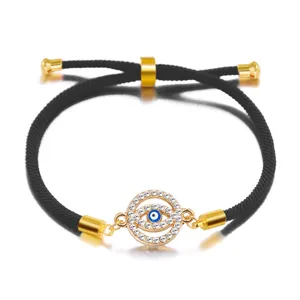 Close-up detail of an adjustable evil eye bracelet decorated with sparkling crystals