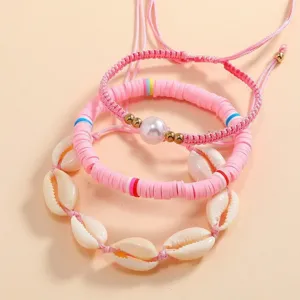 Boho beach bracelet set with natural shells, pink clay beads and faux pearl detail