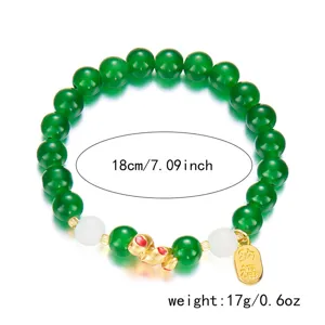 Detailed view of green beaded snake bracelet with weight and size specifications