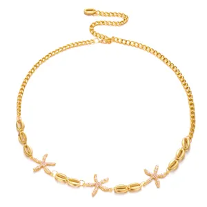 Bohemian gold beach waist chain featuring starfish charms and white rice beads for summer