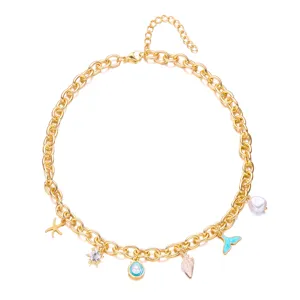 Detailed view of a gold ocean-themed necklace featuring starfish shell and pearl pendants