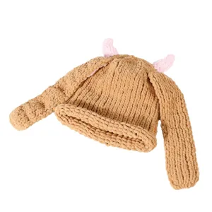 Cute chunky knit beanie hat with long ear flaps and pink horns, cozy warm winter pullover cap.