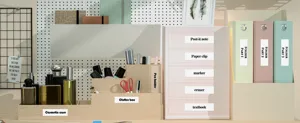 Desktop storage organizer boxes with printed English adhesive labels for daily office use.