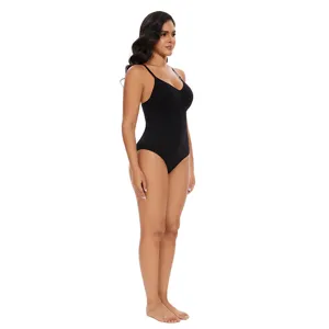 Side view detail showing seamless shaping and high waist design of the black slimming bodysuit.