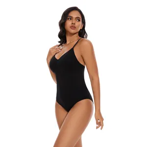 Black seamless shaping bodysuit with V-neck and thin straps for tummy control and hip lift.