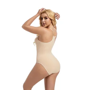 Detailed view of seamless beige shaping bodysuit featuring adjustable straps and tummy control.