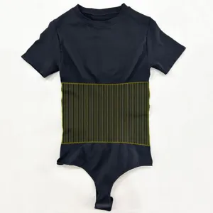 Detail view of black short-sleeve shaping bodysuit with targeted waist compression lines.