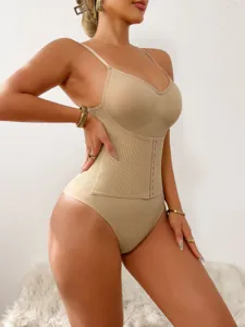 Close-up view of the nude shapewear highlighting the front hook-and-eye closure and tummy control.