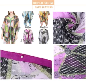 Detail view of printed chiffon shawl featuring a pearl clasp and diverse geometric patterns.