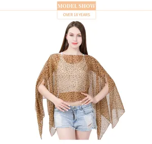 Leopard print faux silk bikini cover-up shawl shown on model for beach sun protection