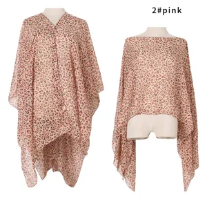 Pink leopard print faux silk bikini cover-up shawl shown on a display mannequin stand