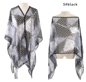 Front and back view of elegant printed sun shawl with pearl button and chic patterns