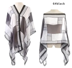 Detailed views of geometric plaid pattern sunscreen shawl in black and white
