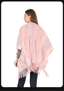 Detailed back view of a pink multi-color knitted shawl poncho featuring long fringe tassels