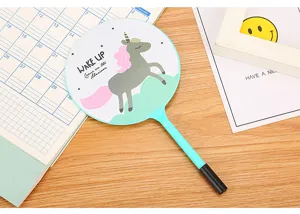 Detail view of a cute cartoon unicorn ballpoint pen with a unique fan-shaped head