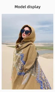 Asian model wearing a bohemian hooded knit shawl poncho in a desert travel scene