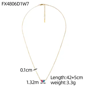 Gold heart necklace with red and blue stones, showing detailed product dimensions