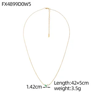 Detail of minimalist gold titanium steel necklace with marquise zircon and pearl pendant.