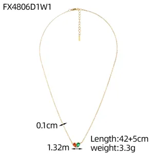 Detailed view of gold heart necklace showing 42+5cm length and gemstone pendant
