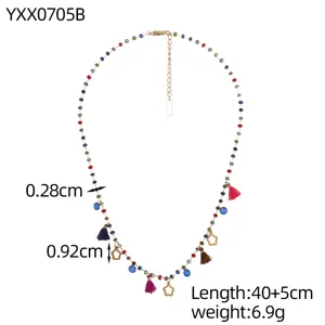 Detailed view of bohemian colorful beaded necklace with tassels and flower charms