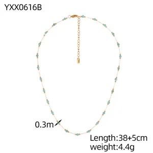 Detailed view of bohemian turquoise beaded necklace showing dimensions and gold clasp