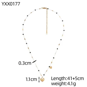 Detailed view and measurements of an elegant handmade beaded necklace with gold heart charms