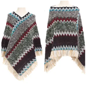 Detailed close-up view of colorful ethnic style knitted poncho featuring vibrant tassel fringe