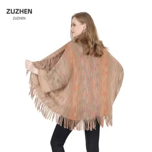 Knitted winter poncho shawl for women with fringe tassels in multi-color mottled knit