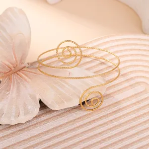Elegante bracciale da braccio dorato geometrico con design a spirale per gioielli