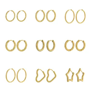 Collection of 18K gold plated titanium steel hoop earrings in textured and shaped designs