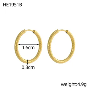 Gold twisted hoop earrings made of titanium steel with 1.6cm diameter and 4.9g weight