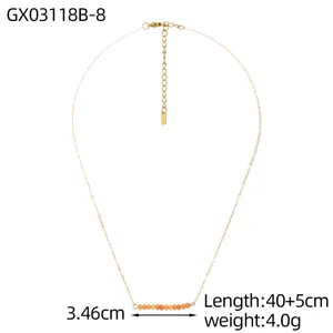 Detailed view of gold chain necklace with orange natural stones, length and weight info