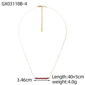 Detail of gold chain necklace with red natural stone beads showing 40+5cm length