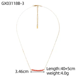 Detailed view of gold thin chain necklace with red natural stone beads and size info