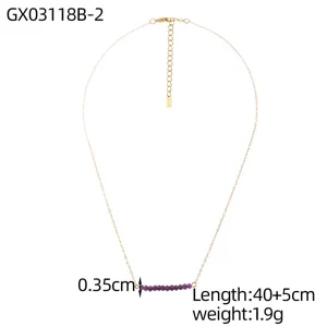 Close-up of gold fine chain necklace with purple natural stones and length measurements