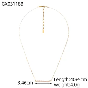 Detail of minimalist fine chain necklace featuring natural stone beads and measurements