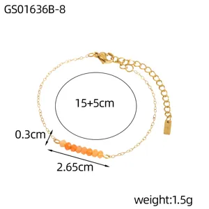 Detailed measurements of gold chain bracelet featuring orange natural stone beads.