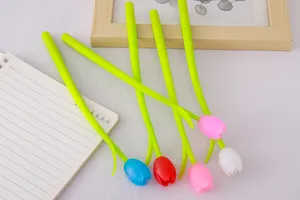 Detail of cute tulip-shaped gel pens with colorful silicone flower heads on a desk