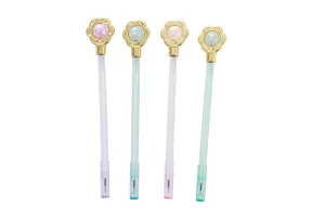 Detailed view of four cute candy-colored gel pens with floral crystal bead tops