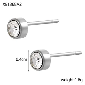 Delicate 4mm silver zircon stud earrings with clear crystal, weighing 1.6g total.