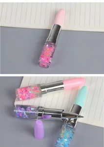 Close-up of creative lipstick-shaped gel pens with colorful quicksand and glitter deco.