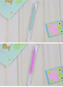 Primer plano de bolígrafos de gel pastel verde menta y púrpura para diario creativo
