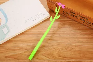 Detailed view of a creative green floral gel pen with a pink flower top for students.
