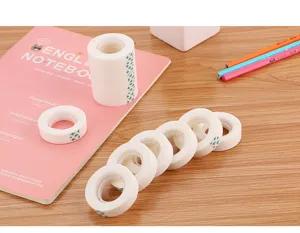 Detailed view of white invisible adhesive tape rolls for office and craft projects