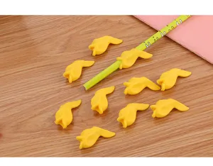 Cute fish-shaped soft rubber pencil grips for children's writing correction
