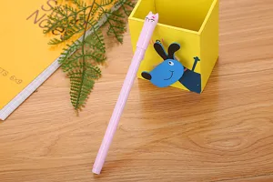 Macro detail of cute pink cat cap gel pen displayed with creative stationery accessories