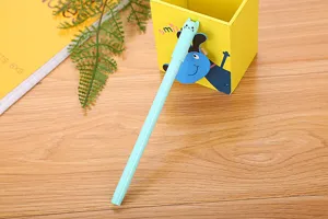 Detail view of a cute light blue cartoon cat gel pen cap on a desk with a pen holder