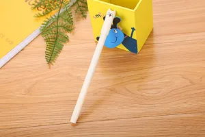 Detailed close-up of a creative white gel pen featuring a cute cartoon cat cap design