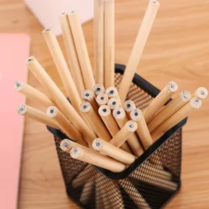 Natural wood pencils in black mesh holder on wooden desk for sketching, drawing, and school work