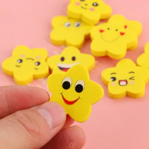 Creatieve gele stervormige gummen met schattige smileygezichtjes voor schoolkinderen.